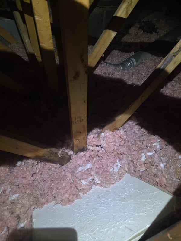 Performed second opinion inspection of attic where water leakage was reported. Discovered that during 2013 furnace replacement, the previous contractor failed to properly remove or cap the old furnace stack, causing water infiltration through the abandoned flue. Documented condition with photos showing water damage to insulation and surrounding structural elements.