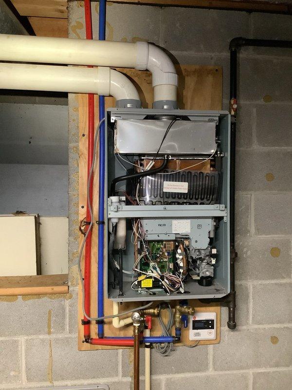 Responded to service call for mouse damage to tankless water heater in 8-year-old home. Performed inspection of unit, which revealed rodent intrusion had affected internal components including wiring and circuit board connections. Completed necessary repairs to damaged wiring, cleaned affected areas, and verified proper operation of unit before concluding service.