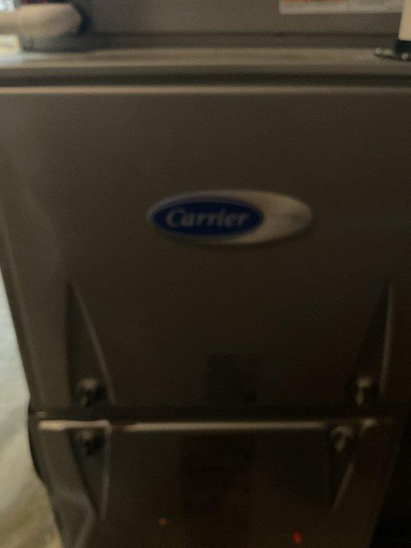 Performed standard maintenance on Carrier furnace system including inspection and cleaning of components. Verified proper operation of the CōR humidifier mounted to the ductwork, confirming water line connections and wiring were secure and functioning correctly. System is in good working condition with no issues identified.