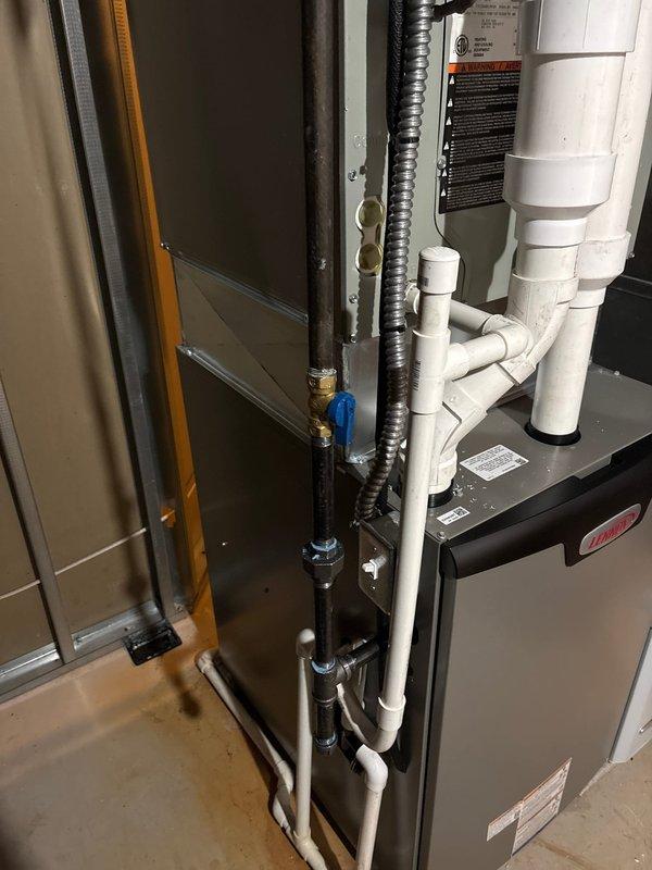 Successfully installed a new Lennox 90% efficiency furnace in the basement utility area, including proper connection of PVC ventilation pipes, flexible gas line with shut-off valve, and integration with existing ductwork. All systems were tested for proper operation, and documentation photos were taken of the completed installation showing the main unit and associated mechanical components.