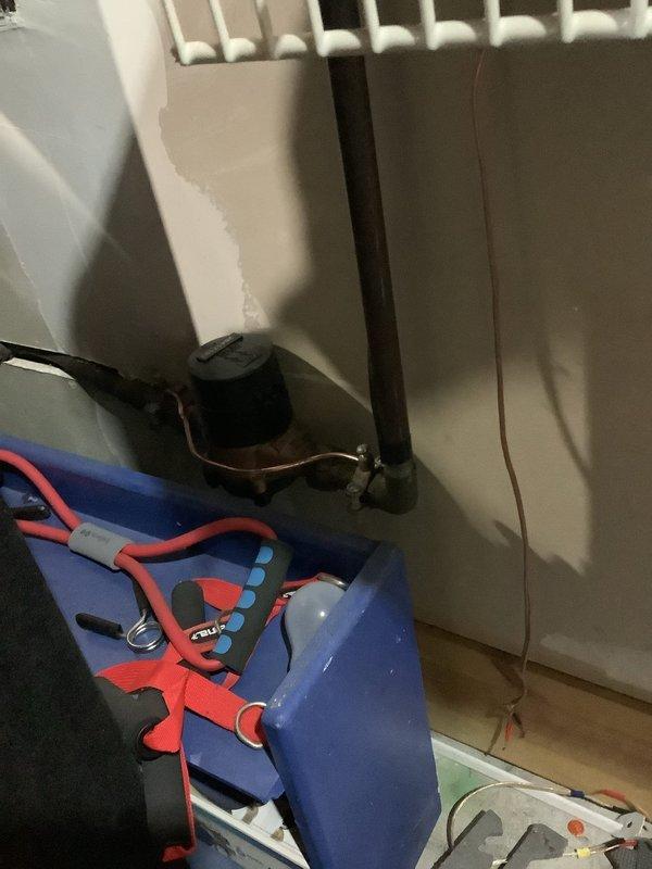 Completed warranty service on home heating system installation. Installed retainer clip on radiator connection and verified proper operation of control unit with associated wiring. Customer will require reinspection after final clip installation.