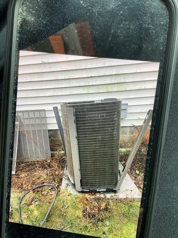 Performed comprehensive AC tune-up on residential system of undetermined age. Inspected and cleaned outdoor condenser unit, removing accumulated debris from around base and fins. Examined motor/compressor assembly, noting normal operational wear and verified proper electrical connections to ensure optimal system performance.