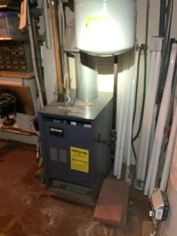 Completed routine heating maintenance for MVP customer. Inspected furnace system with attached hot water heater, checking all connections and ductwork. Verified pressure/temperature gauge readings were within normal operating parameters on boiler system.