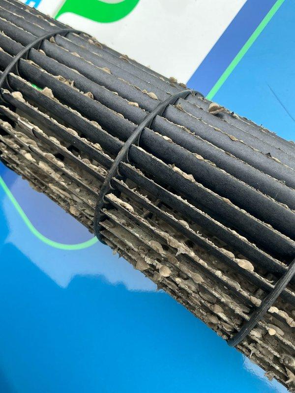 Performed thorough cleaning of HVAC system components, including removal of significant dust and debris buildup from the evaporator coil fins and complete blower wheel cleaning to restore proper airflow and system efficiency.