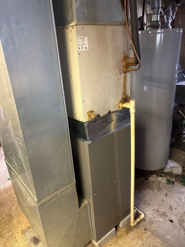 Completed installation of an 80% efficiency furnace as the second job at this location. The new unit was properly connected to existing ductwork in the utility room, with all connections secured and labeled according to manufacturer specifications. System was tested for proper operation and is functioning as designed alongside the existing water heater and humidifier installation.