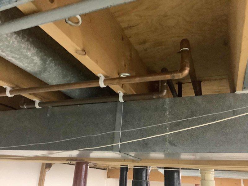 Inspected and repaired sink stopper mechanism in downstairs bedroom bathroom and replaced bathtub stopper in downstairs bathroom to restore proper function. Assessed water heater vent pipe in basement which showed signs of leakage at connection point with visible corrosion and improper sealing; recommended professional replacement of vent pipe assembly with proper sealing to prevent further water intrusion and potential carbon monoxide concerns.