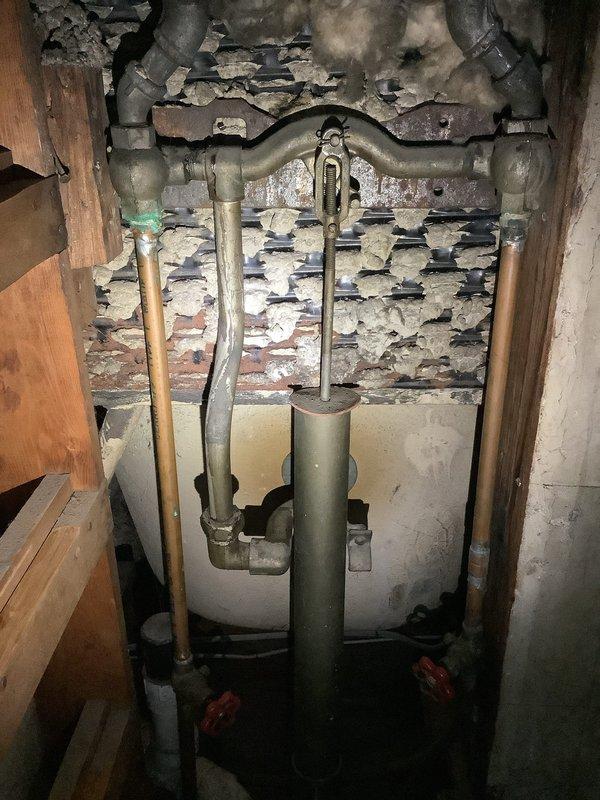 Performed complete water system upgrade including replacement of multiple 9 1/2" shut-off valves in basement with new ball valves. Coordinated with city water department for main water valve replacement. Installed new Bradford White 50-gallon water heater with thermal expansion tank per code requirements, including 6-year warranty. Replaced outdated 1/2" gas valve to furnace with quarter-turn valve. Successfully cleared drain blockage in third floor tub/shower and installed new waste and overflow assembly.