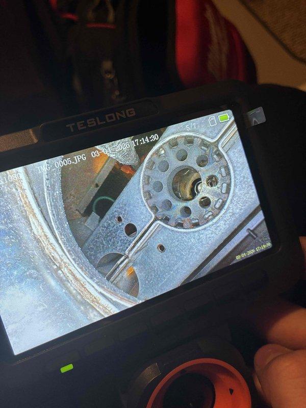 Performed scheduled maintenance on furnace for MVP customer. Used TESLONG borescope to inspect internal components, revealing a circular perforated disc/wheel with signs of wear. Utilized Allen wrench to make necessary adjustments to mechanical elements during the service visit.
