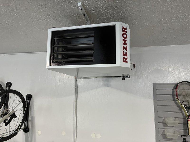 Completed scheduled IAQ service on Lennox HVAC system and inspected wall-mounted Reznor heating unit. Applied humidifier drain tabs (#413) for preventive maintenance and documented system condition with photos for service records.