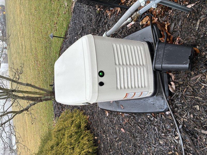 Performed scheduled maintenance on 1-year-old residential generator system. Conducted comprehensive inspection of exterior housing and ventilation panels, confirming proper installation on mulch bed with adequate clearance. Examined interior components including pump assembly, connection points, and insulation material; verified all mechanical connections were secure and operational status indicators functioning normally.