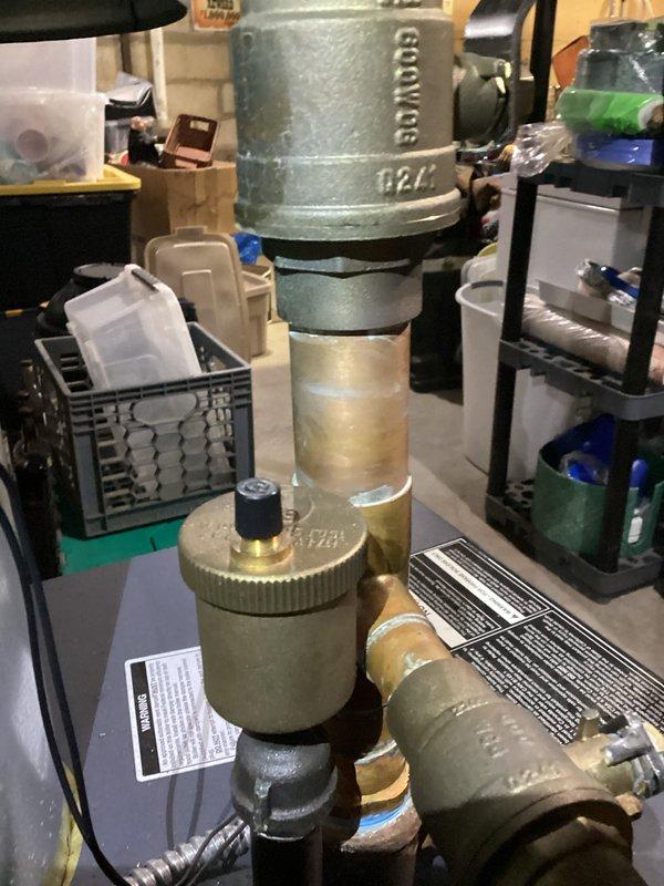 Performed scheduled maintenance on mini split system and boiler. Checked system pressures which were reading approximately 30-35 PSI, within normal operating range. Inspected water supply components including pressure regulator valve and associated copper/galvanized piping, confirming proper operation of both heating systems.