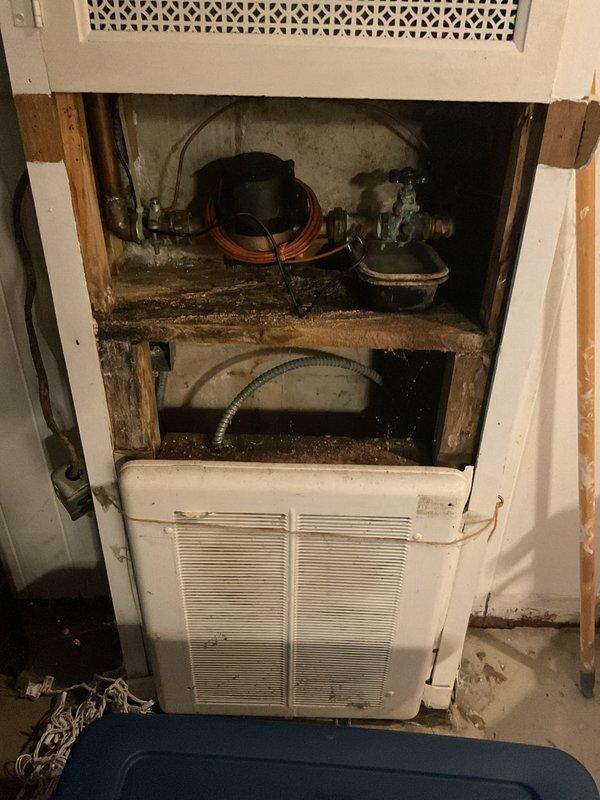 Completed replacement of 3/4" main water shut off valve and installed meter isolation valve after meter. Inspection revealed significant water damage at floor junction with visible moisture deterioration and mold formation. Work included accessing the plumbing through wall cavity where copper piping was exposed, addressing the source of the moisture issues that had affected surrounding wooden framing.