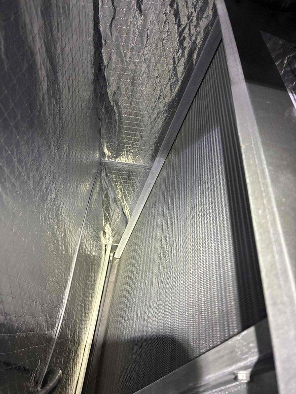 Performed scheduled maintenance on natural gas furnace as part of recurring MVP Heating service. Inspected and photographed interior ductwork, confirming proper insulation integrity with foil-faced lining and filter assembly in good condition. Examined blower wheel/fan assembly which showed clean metallic blades with no visible deterioration or buildup, ensuring optimal airflow performance.