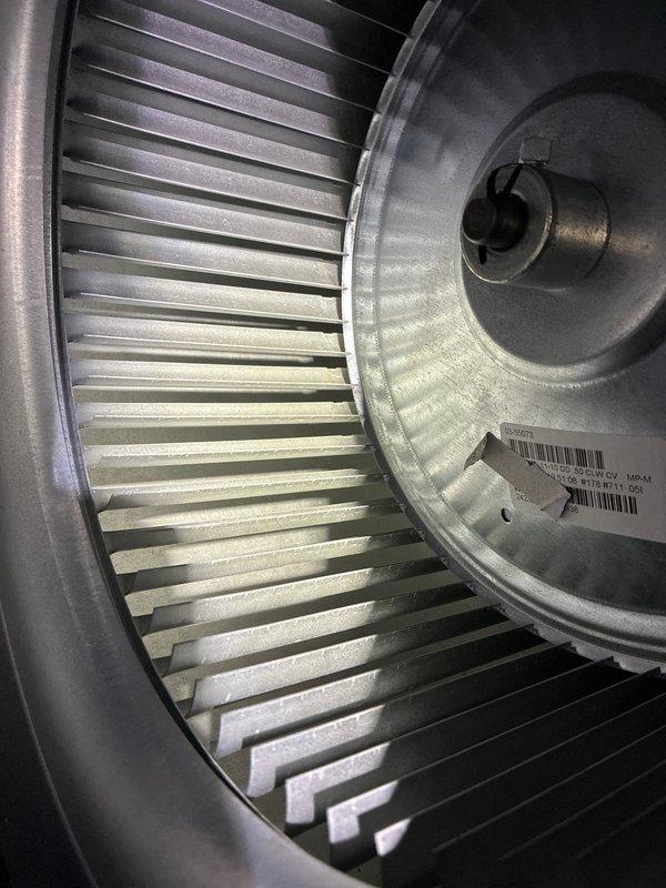 Performed scheduled maintenance on natural gas furnace as part of recurring MVP Heating service. Inspected and photographed interior ductwork, confirming proper insulation integrity with foil-faced lining and filter assembly in good condition. Examined blower wheel/fan assembly which showed clean metallic blades with no visible deterioration or buildup, ensuring optimal airflow performance.