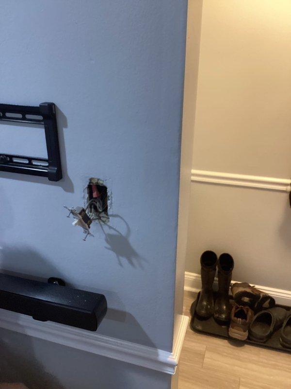 Inspected customer's sitting room to provide quote for installation of customer-supplied lighting fixtures and ceiling fans. Observed damaged electrical boxes with exposed wiring in walls requiring proper installation and repair. Accessed attic space to evaluate wiring pathways for new fixture installations where currently none exist.