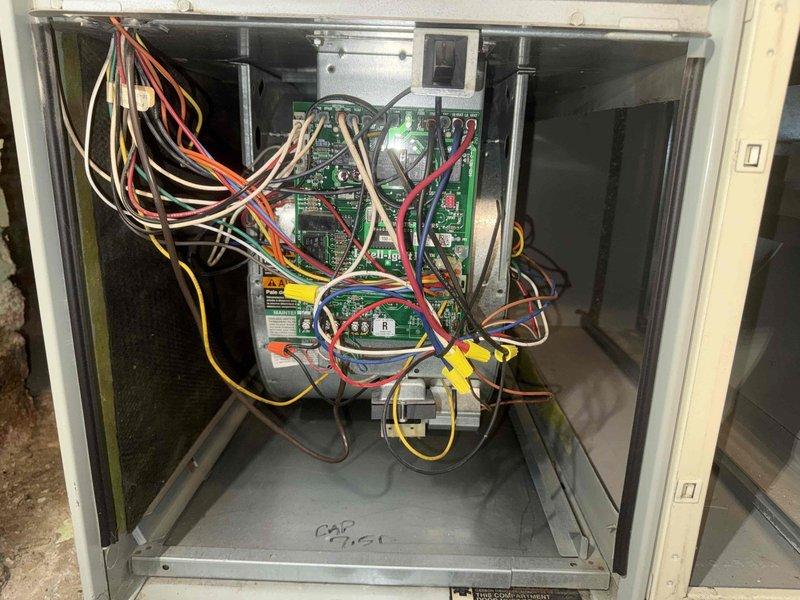 Performed routine maintenance on furnace as part of MVP service agreement. Identified significant frost buildup on refrigerant lines, indicating potential restriction or airflow issues. Inspected control board and wiring connections, noting all components were properly secured with no visible damage or loose terminations.