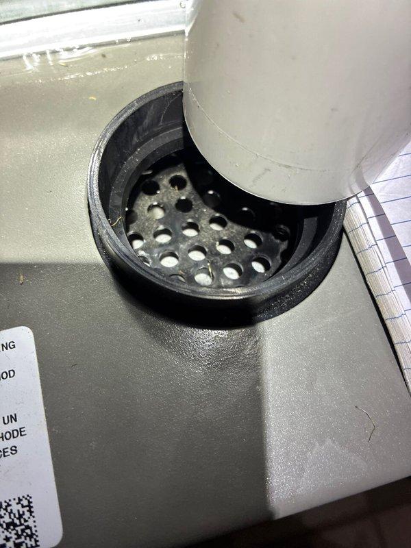 Performed furnace maintenance on natural gas MVP system. Inspected control board with multiple wire connections and verified all electrical components were functioning properly. Checked condensate drain system and confirmed proper drainage with no blockages in the perforated drain assembly.