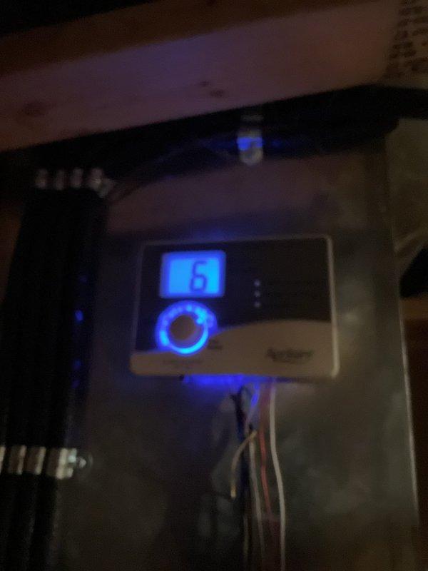 Installed new programmable thermostat as part of warranty service. Replaced dirty air filter during installation and verified system functionality with proper temperature display and control operation.