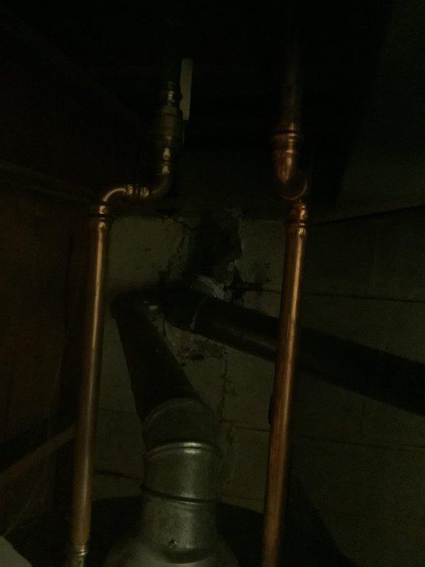 Conducted evaluation of 26-year-old furnace system. Inspected existing copper water lines and metal ducting in utility area, noting significant aging and wear. Provided replacement quote for complete system upgrade.