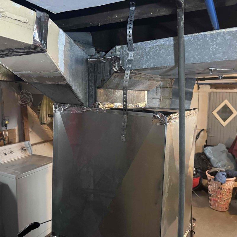 Performed comprehensive furnace tune-up including inspection of ductwork system and verification of proper sealing at connection points. Accessed and examined control board circuitry, checked all electrical connections, and verified proper operation of safety components. All systems functioning within normal parameters after service.