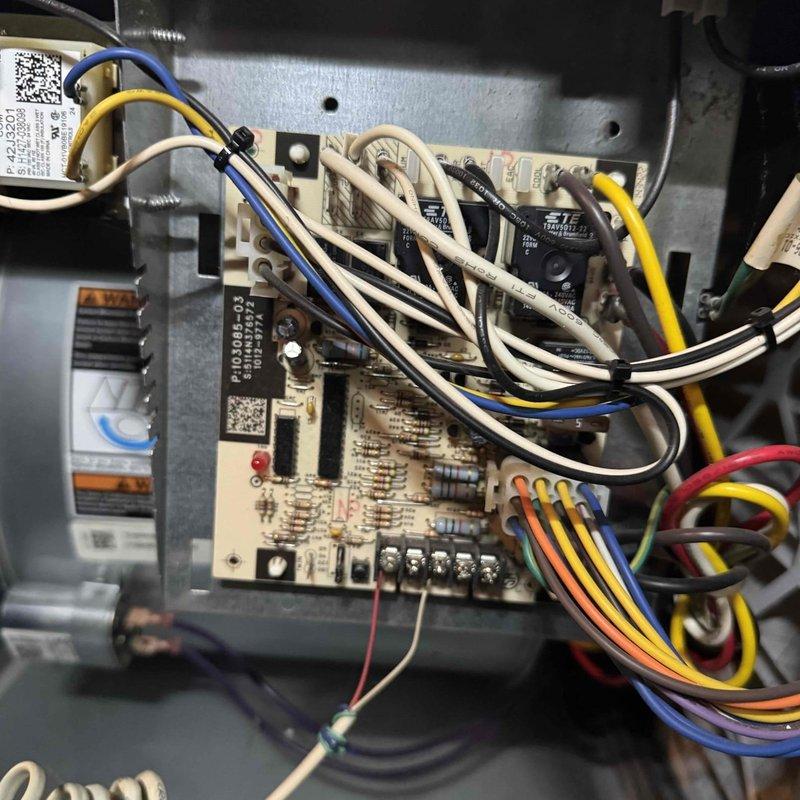 Performed comprehensive furnace tune-up including inspection of ductwork system and verification of proper sealing at connection points. Accessed and examined control board circuitry, checked all electrical connections, and verified proper operation of safety components. All systems functioning within normal parameters after service.