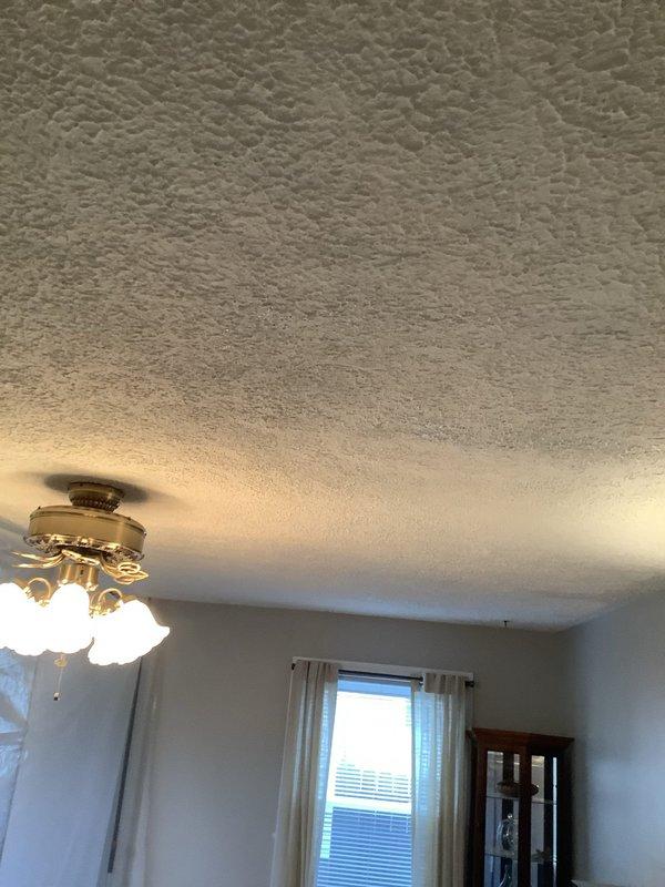 Conducted comprehensive assessment of residential rewiring requirements in 60-year-old home undergoing extensive remodel. Documented existing electrical infrastructure in areas where walls and ceilings have been opened to studs and joists. Provided customer with detailed pricing options for complete rewiring project, including fixture replacement considerations for outdated ceiling fan installation with multiple glass shades.