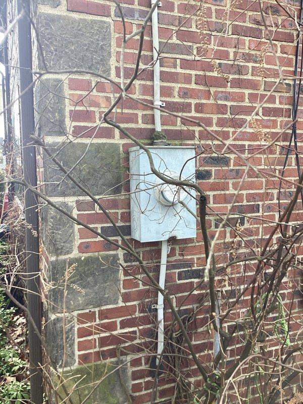 Responded to service call for intermittent power issues where customer expressed fire safety concerns. Upon inspection, found weathered electrical meter box with visible rust and dirt accumulation. Examined internal components including connection terminals and wiring, noting signs of age and debris buildup that could potentially cause intermittent electrical supply problems.