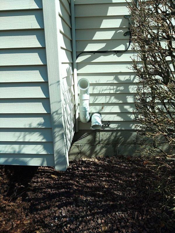 Completed installation of new 90K BTU air conditioning system with proper electrical connections to junction box. Verified all knockout holes were properly utilized for wiring. Installed PVC condensate drainage system with appropriate downspout and extension to direct water away from the foundation, ensuring proper runoff management.