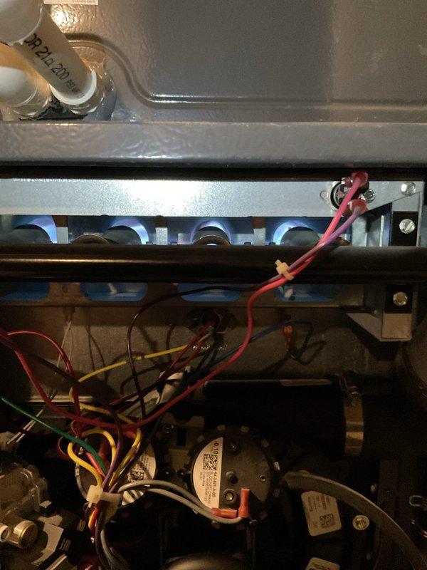 Performed diagnostic inspection on 3-year-old gas furnace exhibiting no operation with blinking red light indicator. Examined interior components including inducer motor assembly, control circuitry, pressure switches, and burner elements. Scheduled follow-up appointment to replace faulty inducer motor after confirming availability of replacement parts.