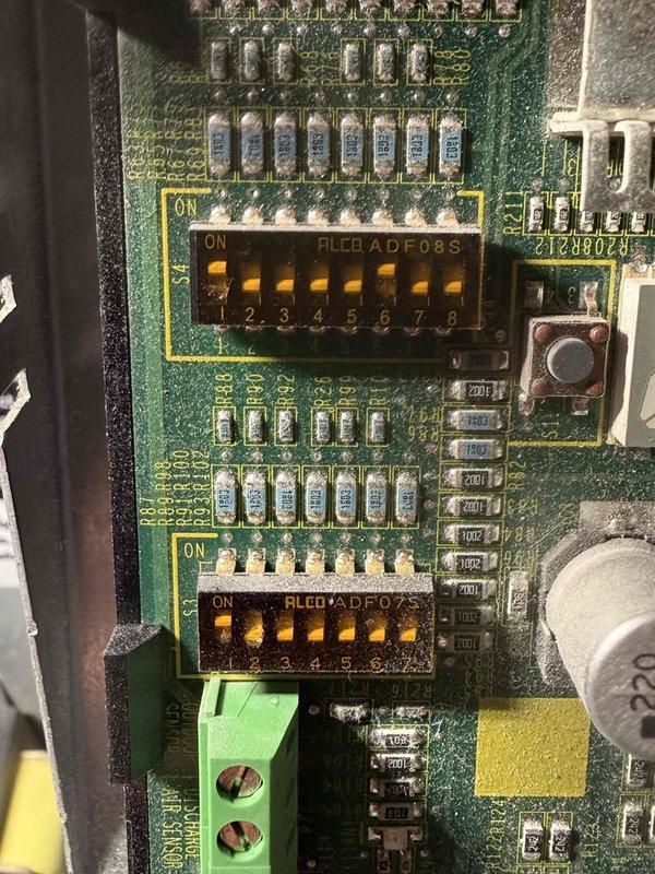 Performed MVP furnace maintenance including inspection of heat exchanger fins and control board. Cleaned light dust accumulation from heat transfer surfaces and verified DIP switch settings on the circuit board. System is now operating within specifications.