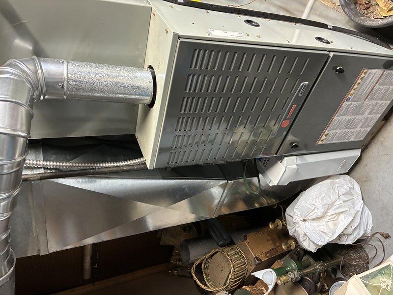 Performed inspection of furnace system and identified a crack in the primary heat exchanger chamber located adjacent to the limit switch. Documented the damaged components with photos and ordered necessary replacement parts (heat exchanger, primary limit switch, and igniter) which arrived in shop on 3/5.