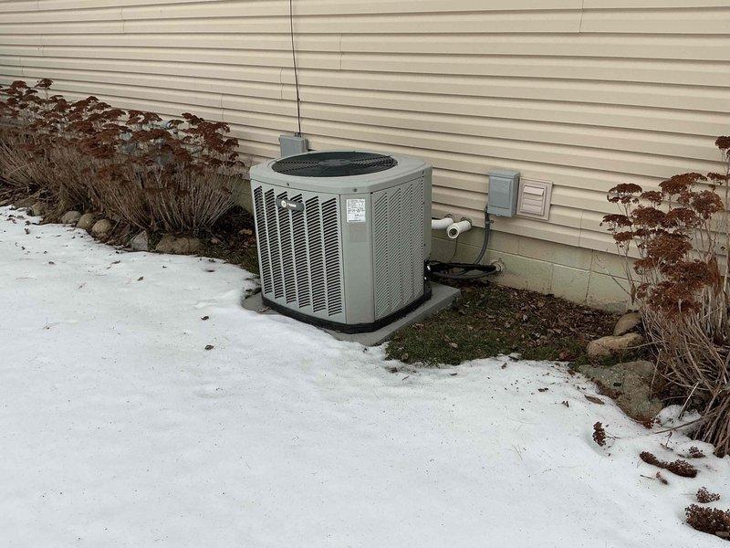 Completed installation of a new 90% efficient Forced Replacement Natural gas furnace, air conditioning system, and humidifier. Installed indoor components including furnace and associated PVC venting in utility room, and mounted outdoor AC condenser unit on concrete pad with proper electrical connections. All systems were tested for proper operation and function according to manufacturer specifications.