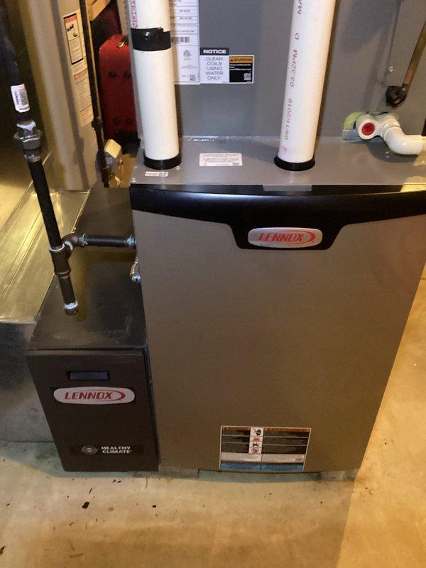 Performed annual furnace maintenance on a Lennox HVAC system with Healthy Climate accessory. Inspected and cleaned air filter, verified proper operation of all components, and confirmed system is functioning correctly. System appears to be in normal working condition with no visible damage or leaks detected.