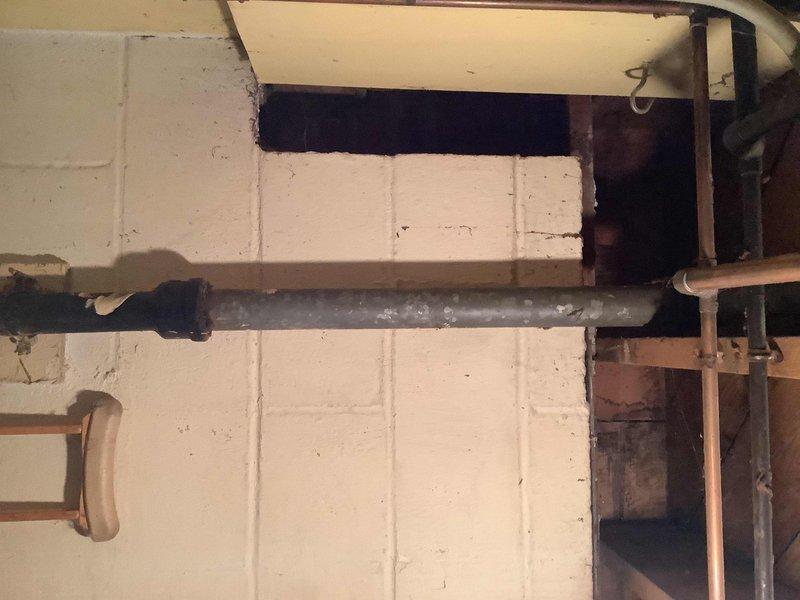 Performed service call at 70-year-old residence with clogged bathroom tub. Inspection revealed heavily corroded iron pipes with significant rusting at threaded connections and coupling joints, likely contributing to drainage issues. Successfully cleared the clog and advised customer about the deteriorating plumbing infrastructure that may require replacement in the future to prevent recurring problems.