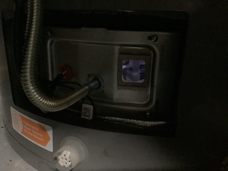 Responded to no hot water call for natural gas water heater. Inspected unit and accessed control panel with electronic display. Diagnosed ignition system failure and restored proper operation of the water heater.