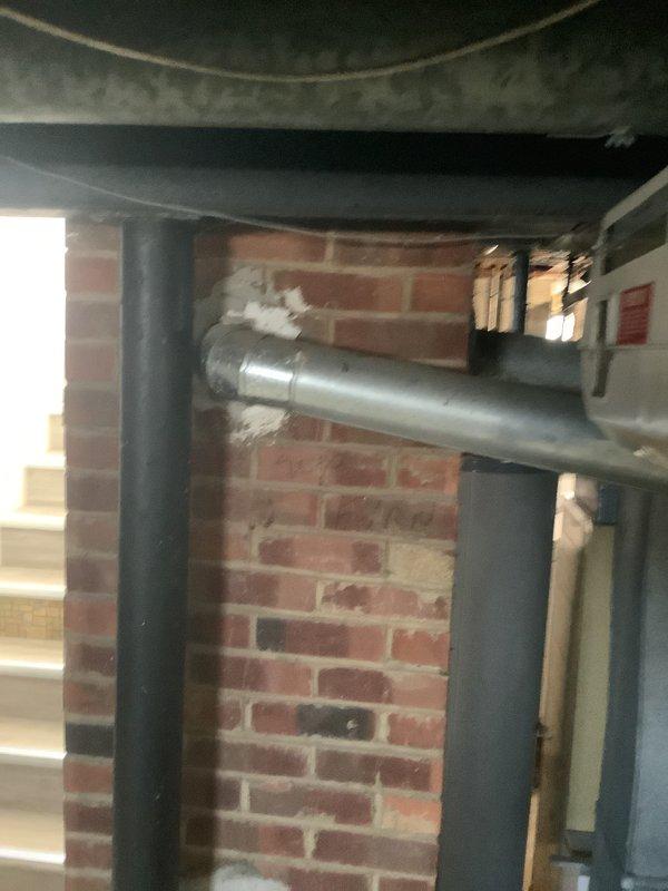 Conducted comprehensive furnace replacement consultation and assessment in basement utility area. Documented existing HVAC system including Tappan air conditioning unit with connected galvanized plenum, copper refrigerant lines, and ductwork configuration. Provided detailed estimate for complete system replacement based on structural constraints and current installation parameters.