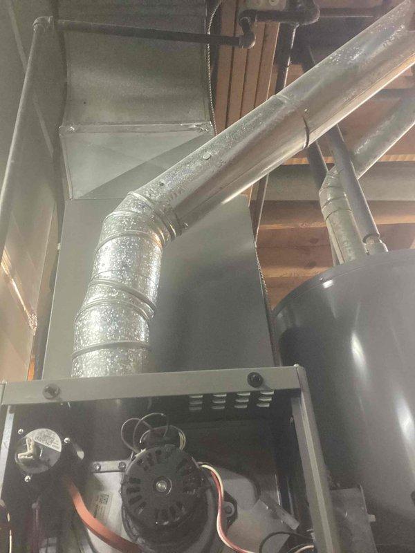 Performed routine seasonal heating maintenance on 4-year-old HVAC system. Conducted comprehensive inspection of furnace components including motor, electrical connections, and control module. Verified proper installation of ductwork and system integrity in basement installation area.