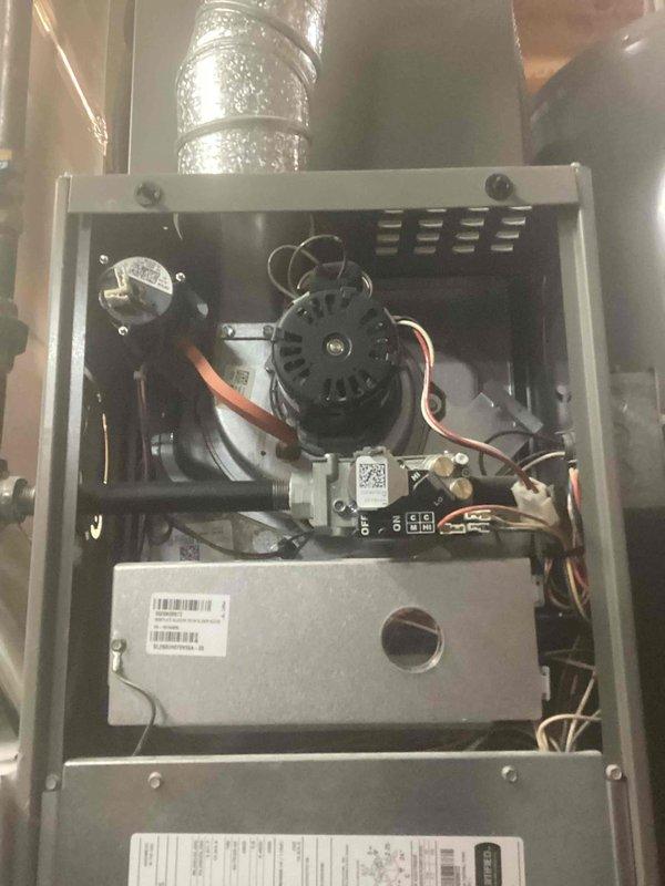 Performed routine seasonal heating maintenance on 4-year-old HVAC system. Conducted comprehensive inspection of furnace components including motor, electrical connections, and control module. Verified proper installation of ductwork and system integrity in basement installation area.