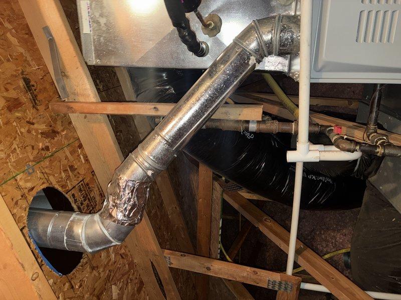 Performed routine heating maintenance on Concord furnace system for MVP customer. Inspected unit connections, including metal ductwork, PVC ventilation pipes, and copper lines. Verified proper installation of flexible metal conduit and checked condition of ductwork joints and metallic tape seals in attic space.