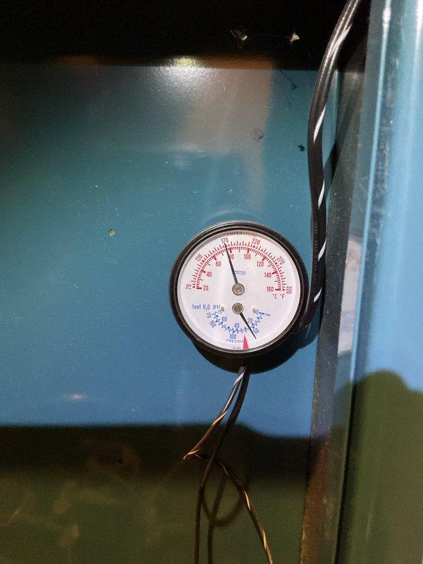 Performed scheduled maintenance on Burnham boiler system. Inspected pressure gauge readings and verified proper operation of all components. System is functioning correctly with no issues identified.