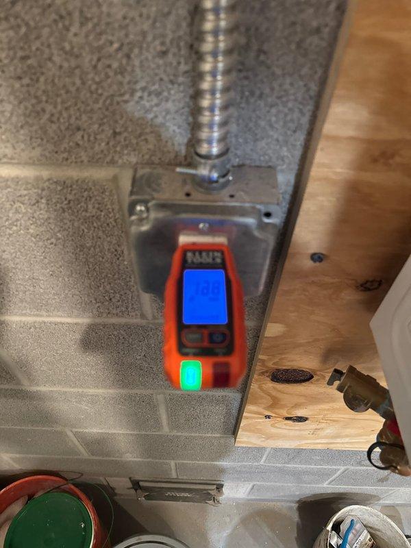 Installed dedicated circuit for tankless water heater in utility area. Performed comprehensive electrical testing with NWP testing device to verify proper voltage, amperage, and ground connection. Circuit tested successfully with appropriate load capacity and demonstrated proper function with green status indicator.