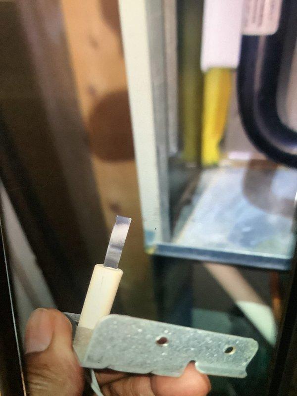 Performed scheduled MVP maintenance service on a 10-year-old furnace system. Inspected interior components including burners, heat exchangers, and wiring connections. Removed and examined ignition sensor bracket, cleaned components, and verified proper operation of the heating system.