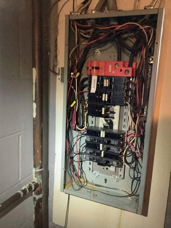 Responded to service call regarding microwave emitting burning odor. Upon inspection, discovered an outdated electrical panel with disorganized wiring and overloaded circuits. Performed complete panel inspection, identified faulty circuit serving the microwave, replaced breaker, and reorganized wiring to prevent future hazards.