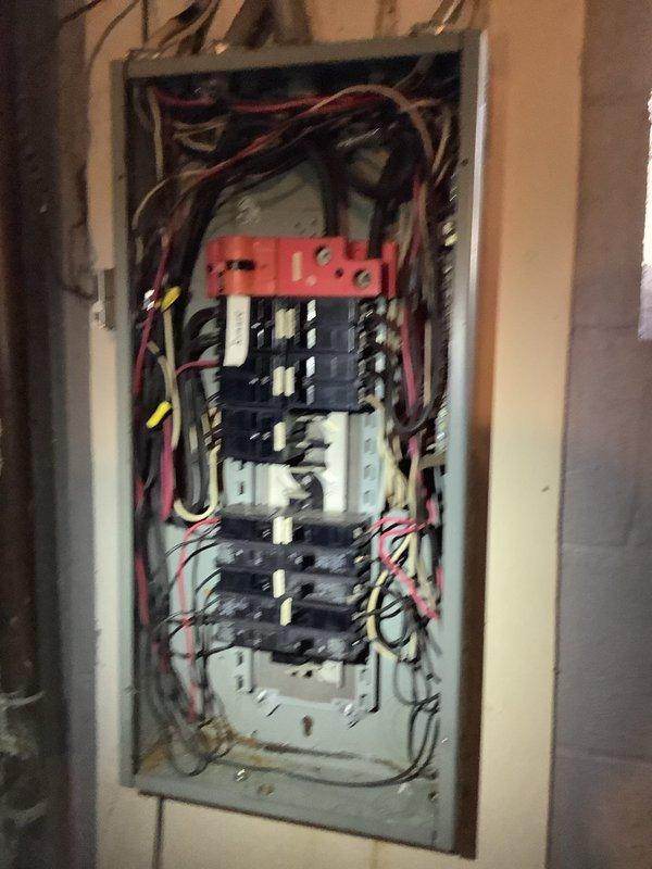 Responded to service call regarding microwave emitting burning odor. Upon inspection, discovered an outdated electrical panel with disorganized wiring and overloaded circuits. Performed complete panel inspection, identified faulty circuit serving the microwave, replaced breaker, and reorganized wiring to prevent future hazards.