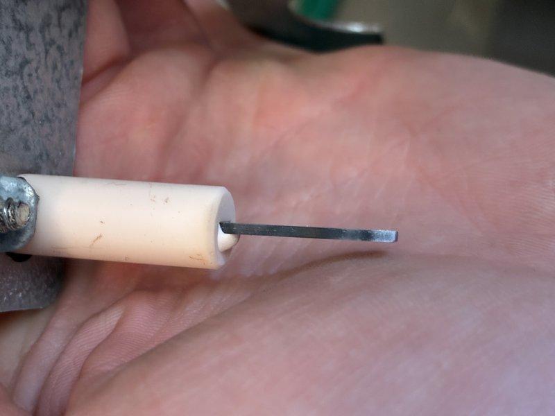 Performed comprehensive furnace tune-up including inspection and cleaning of ignition assembly. Removed and examined igniter electrode and flame sensor, finding light carbon buildup that was cleaned to restore proper operation. Also inspected and secured mounting bracket hardware to eliminate vibration issues, ensuring optimal system performance for the heating season.