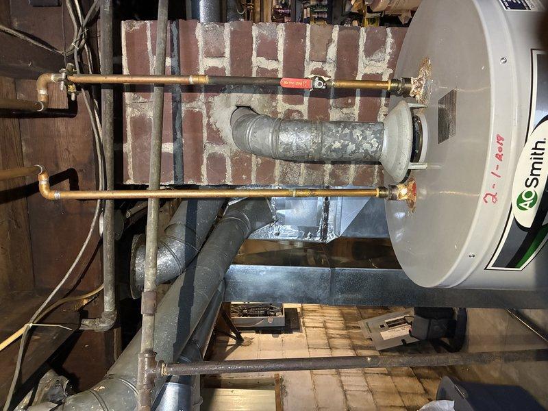 Responded to service call regarding electrical issues with washer circuit in century-old home. Diagnosed buzzing sound from breaker panel when washer circuit was engaged. Discovered loose connections at the breaker terminal causing arcing and power interruption. Repaired faulty connection, tightened all panel terminations, and verified proper operation of washer circuit with no further noise or power issues.