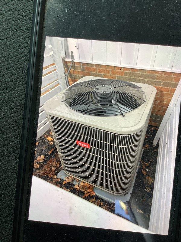 Performed scheduled MVP Cooling maintenance on Bryant condensing unit. Inspected compressor, refrigerant lines, and drain pan for proper operation. Unit appears operational with normal wear; exterior cabinet shows good condition despite seasonal debris accumulation around base.