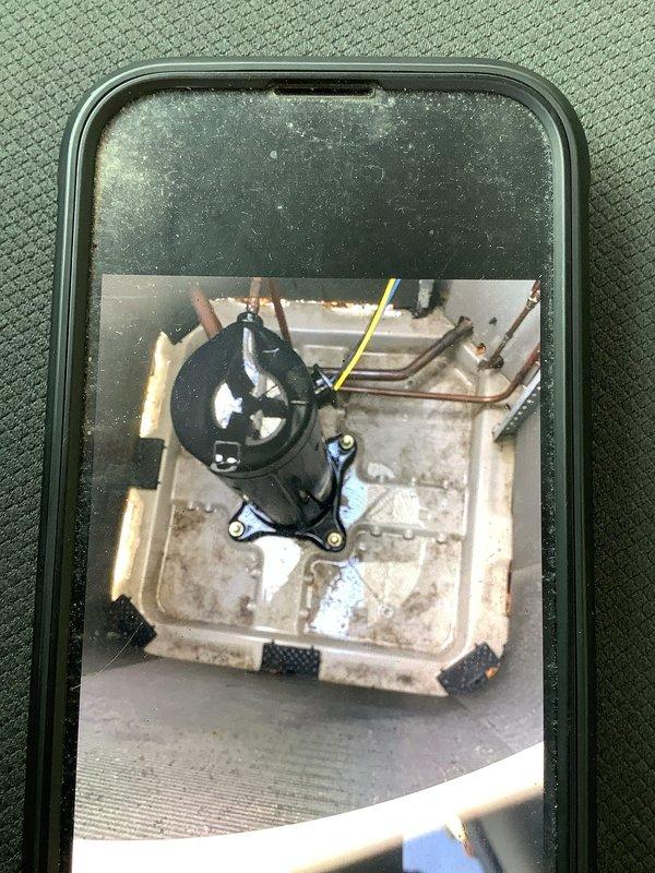 Performed scheduled MVP Cooling maintenance on Bryant condensing unit. Inspected compressor, refrigerant lines, and drain pan for proper operation. Unit appears operational with normal wear; exterior cabinet shows good condition despite seasonal debris accumulation around base.