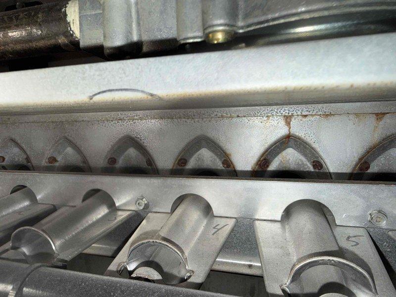 Performed scheduled MVP Cooling maintenance service and documented significant corrosion in the electrical disconnect box, including deteriorated contacts and rust on fuse connections. Observed moisture accumulation and early-stage corrosion on the evaporator coil fins (units 4 and 5), indicating potential condensate drainage issues that could impact system efficiency.