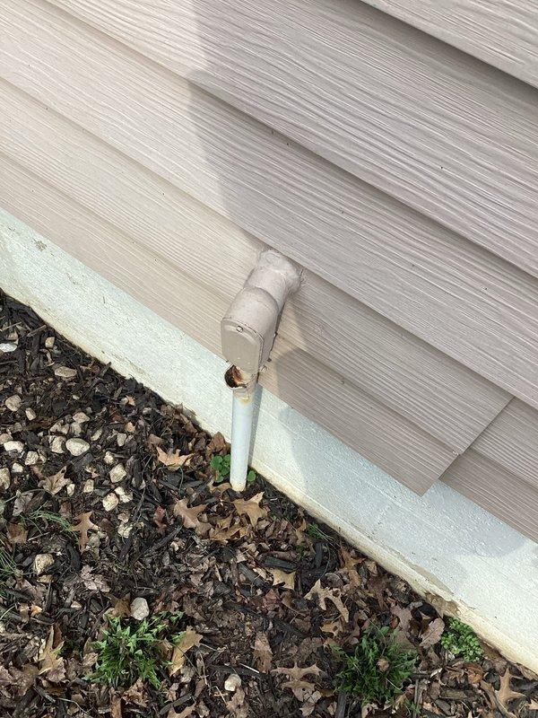 Conducted on-site assessment of outdoor electrical outlet installation needs. Identified location in yard area where electrical outlet is required, marked by stake. Evaluated existing siding and foundation to determine appropriate installation method and materials needed for proper weatherproof exterior outlet.